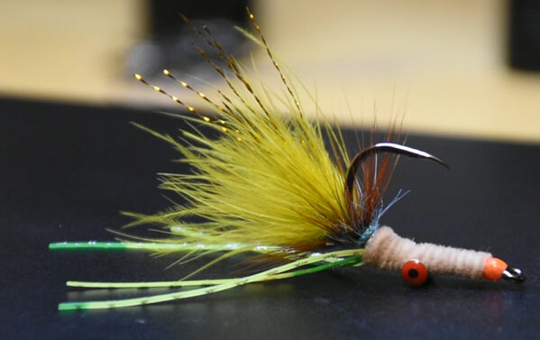 American Tied Olive Tan Wacko Squimp Olive Tan Wacko Squimp are tied on Gamakatsu Hooks. This a great Striped Bass fly.  I have caught Corbina on it as well. 