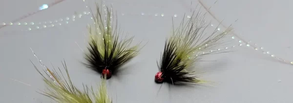 Tying Olive Micro Woolly Bugger Personally I have found trout really enjoy a Micro Wooly Bugger tied on a jig hook with a red bead.