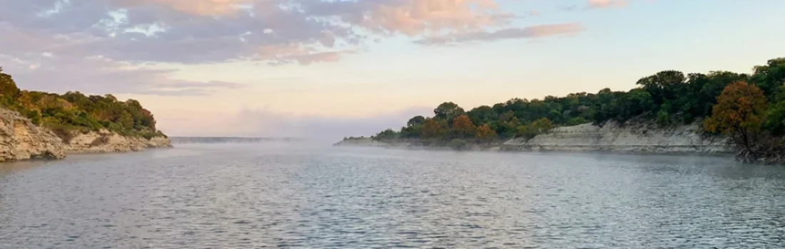 Bass fly fishing Lake Whitney and Lake Waco in Texas offers a unique challenge with substantial rewards for dedicated anglers