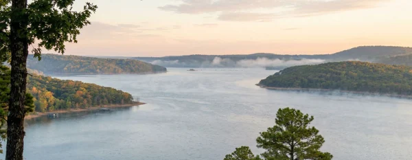 Fly Fishing Bass Beaver Lake Arkansas experience for dedicated anglers seeking trophy fish in deep timber for Premier Bass Fly Fishing