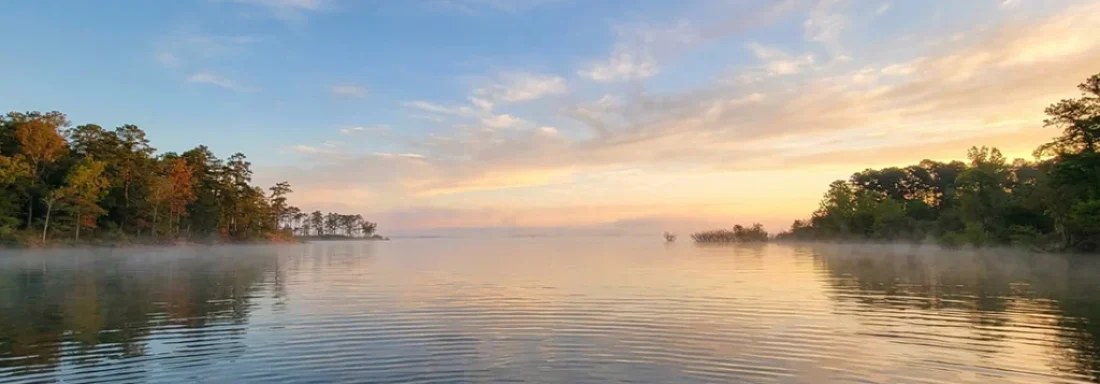 Fly Fishing for Bass Sam Rayburn Reservoir Texas, a premier destination for anglers seeking big catches and scenic views.