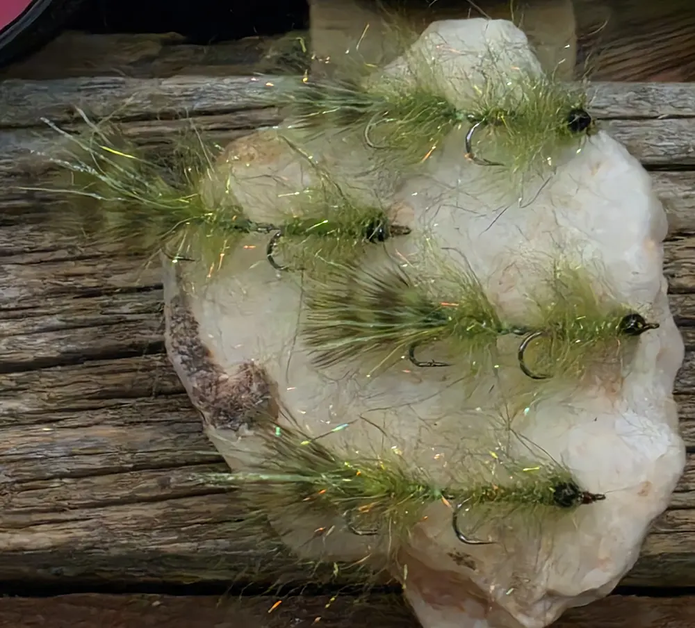 Fl. Sasquatch Bush Fur Leech is a deadly articulated saltwater and freshwater pattern tied with chartreuse Krinkle Flash, Green Chartreuse Ewing Chickabou, and Semperfli threads on Partridge hooks. Built to move, built to eat.