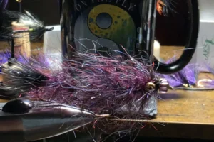 Monster Bush Fur Blood Leech 1. 3 Blood Leech streamer fly – Monster Bush fur, Missouri River garnet egg, articulated on Owner stinger & Dai-Riki 4XL hooks. Built for big trout on the any River.