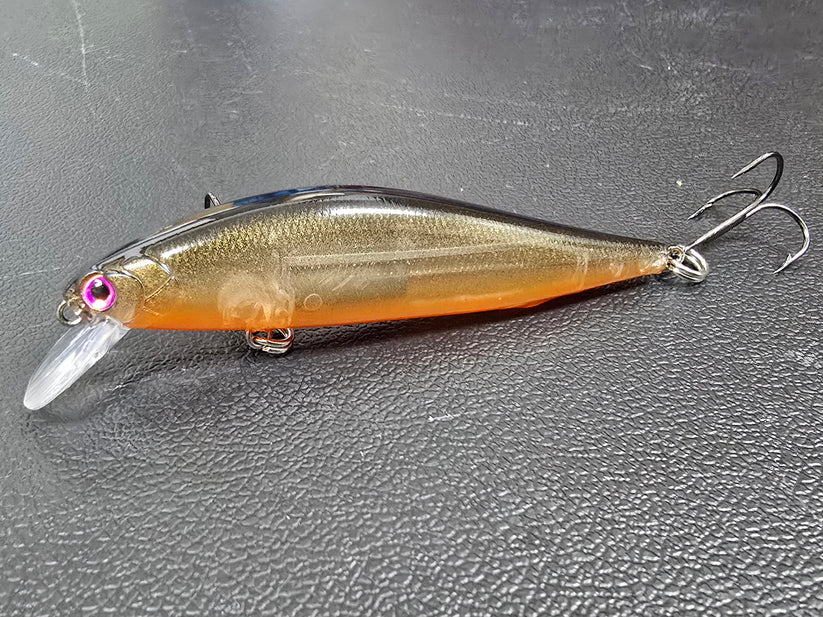 Black and Orange Mini Jerk bait, Saltwater on the fly.
