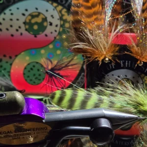 Gold Digger: a chartreuse grizzly marabou streamer on a Partridge SUJ hook. Browns hit it year-round and bass can’t leave it alone. Tied in Montana.