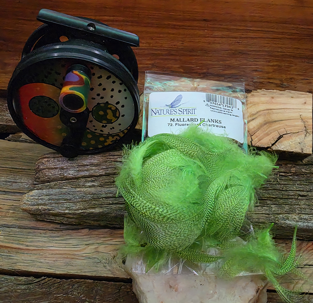 Fl. chartreuse mallard flank feathers for snook shrimp and bass poppers. About 60 hand-sorted feathers per 2g pack, mixed sizes, junk pulled - Saltwater on the fly.
